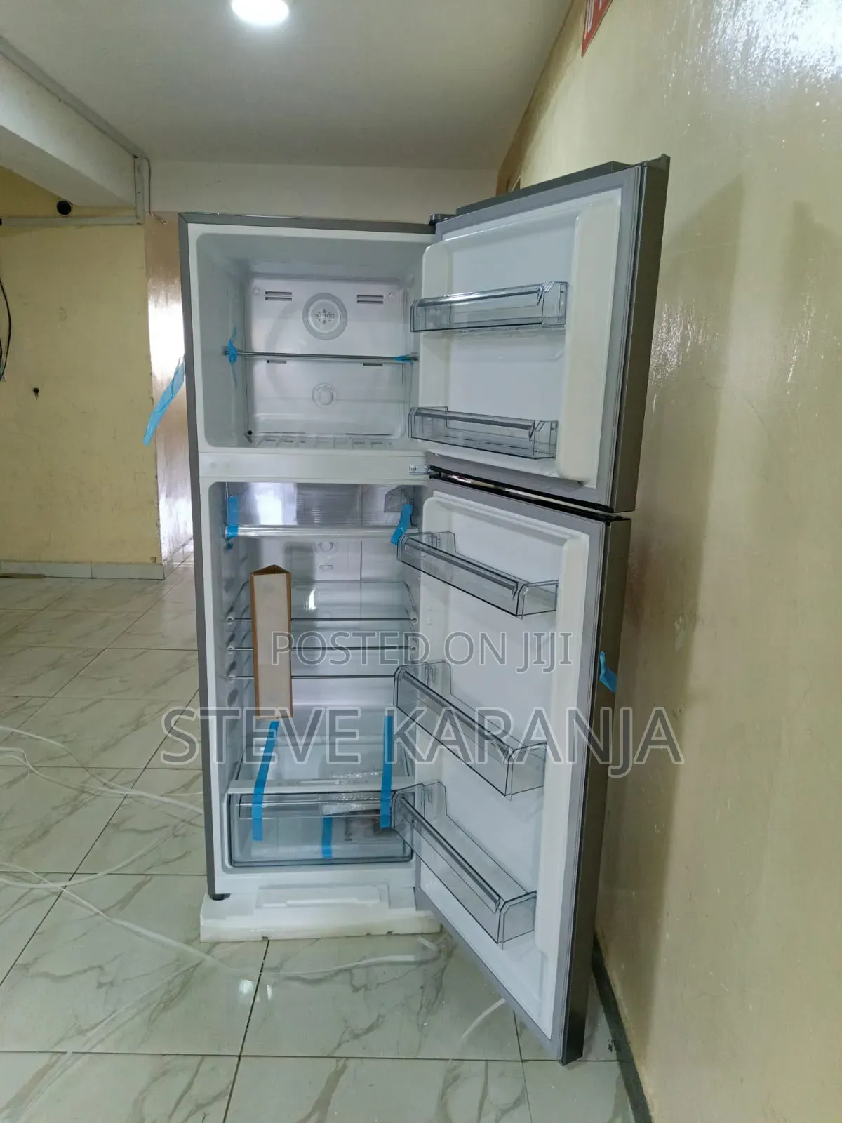 247l Mika Fridge With Freezer Section Top Mount