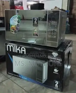 Restocked Mika#Digital Microwave With New Grill Oven