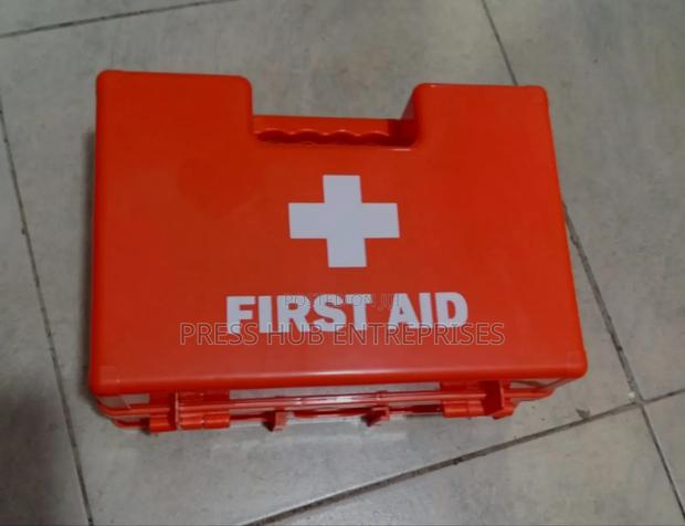 Red, Medium-Sized First Aid Kit" ' - main view