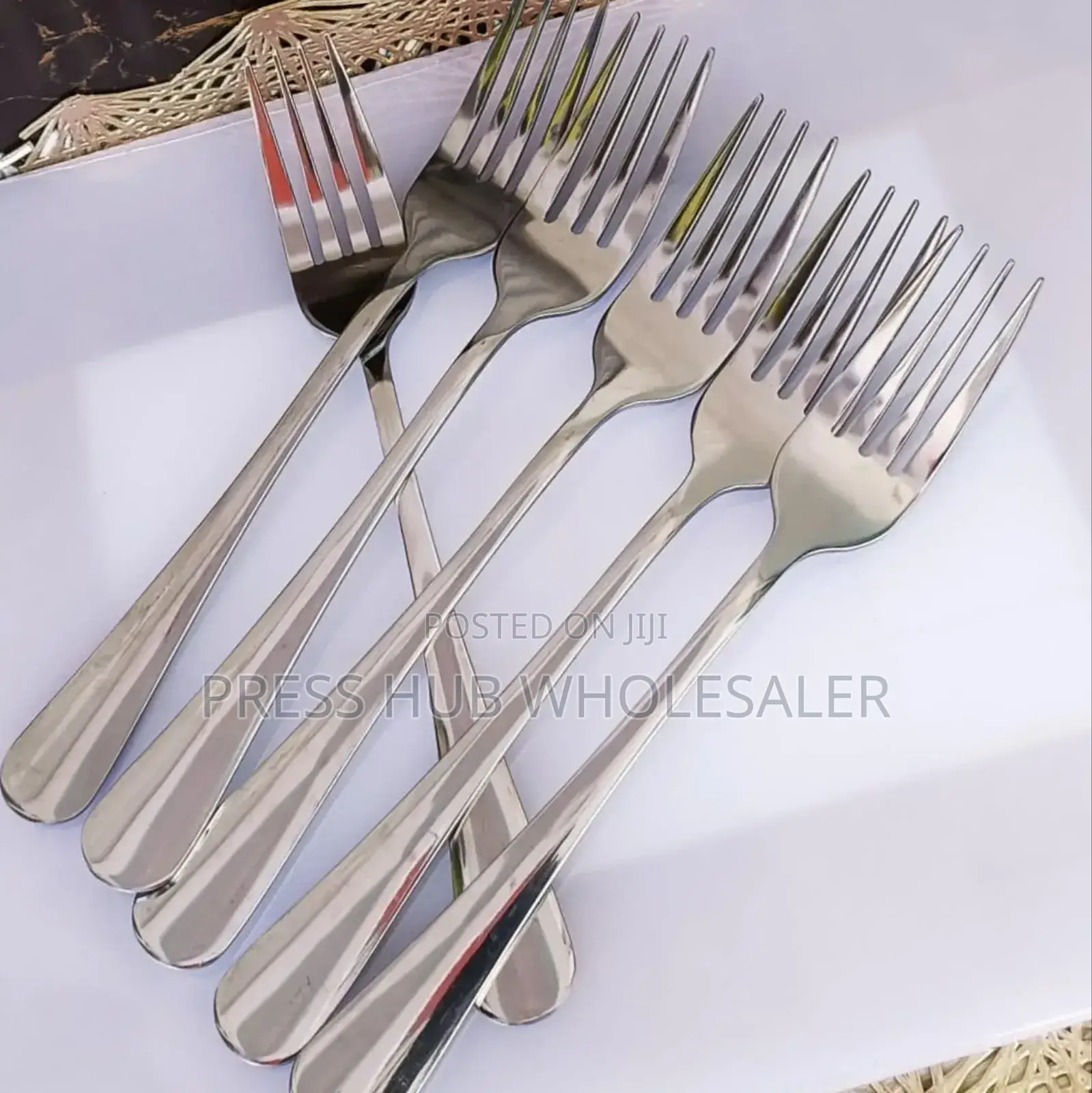Six Heavy-Gauge Stainless Steel Dinner Forks.