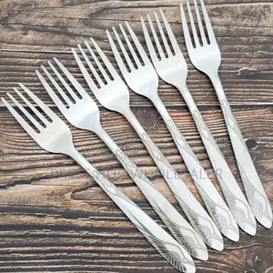 Six Heavy-Gauge Stainless Steel Dinner Forks." 