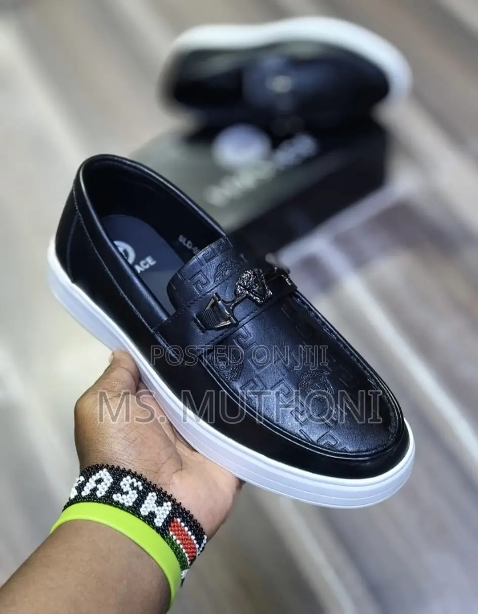 Versace Loafer With a White Sole and a Gold-Tone Medusa Head Bit