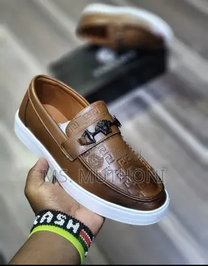 Versace Loafer With a White Sole and a Gold-Tone Medusa Head Bit