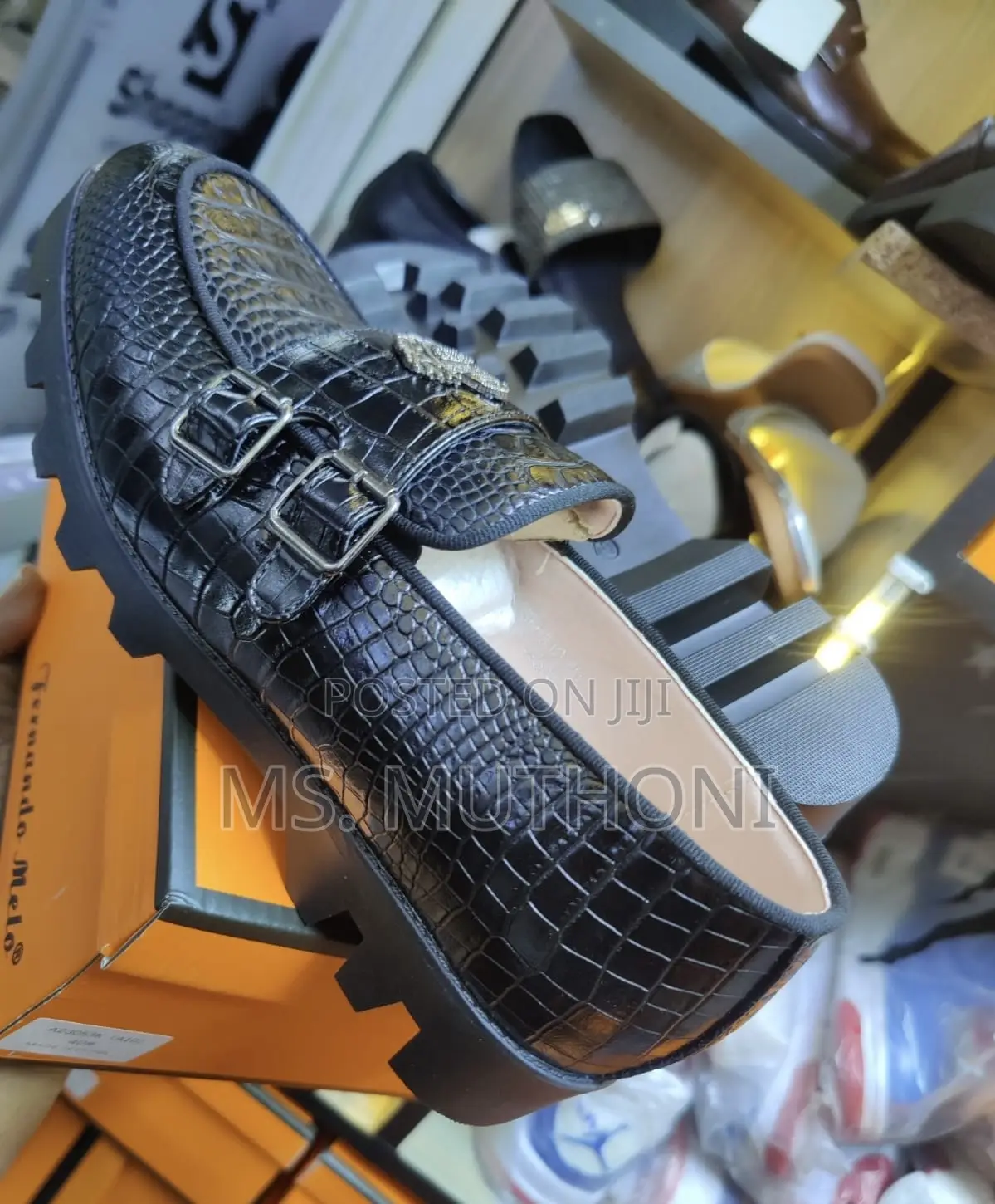 Crocodile-Textured Double-Monk Strap Loafers With a Chunky Lug Sole.