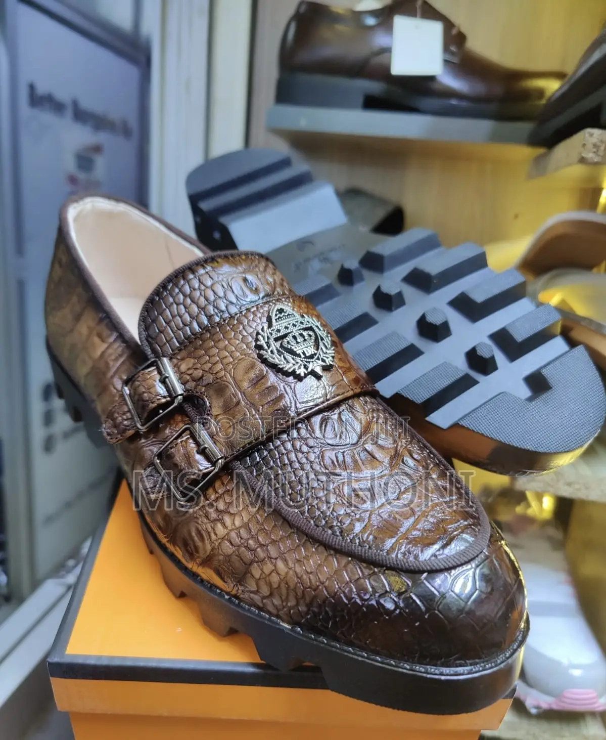 Crocodile-Textured Double-Monk Strap Loafers With a Chunky Lug Sole.