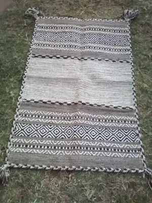 Ivory Pure Cotton Rugs 120 by 180cms