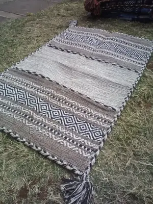 Ivory Pure Cotton Rugs 120 by 180cms