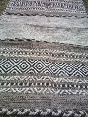 Ivory Pure Cotton Rugs 120 by 180cms