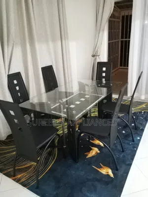 Premium Executive Glass Top Dining Set With Six Leather Chairs