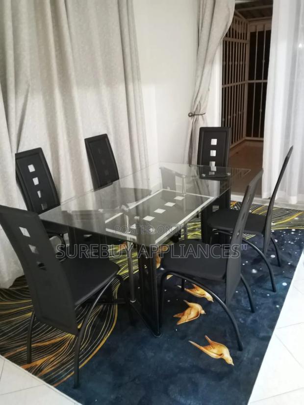 Premium Executive Glass Top Dining Set With Six Leather Chairs