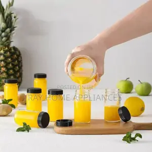 Gingershots Glass Bottles With Black Plastic Lid
Reusable 100ml