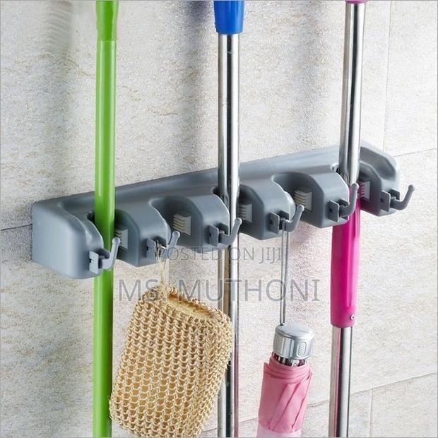 Wall-Mounted Broom and Mop Holder / Organizer - main view