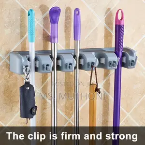 Wall-Mounted Broom and Mop Holder / Organizer