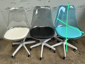 Padded Clear Eames Chairs