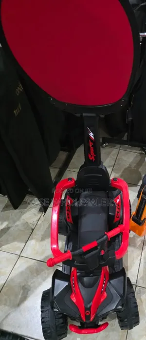 Red and Black Kids' Ride-on Push Car With an Adult Handle.