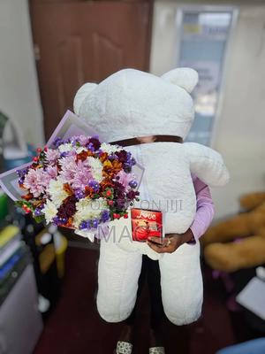 Fancy Cute Teddy Bear With a Bunch of Flowers - main view