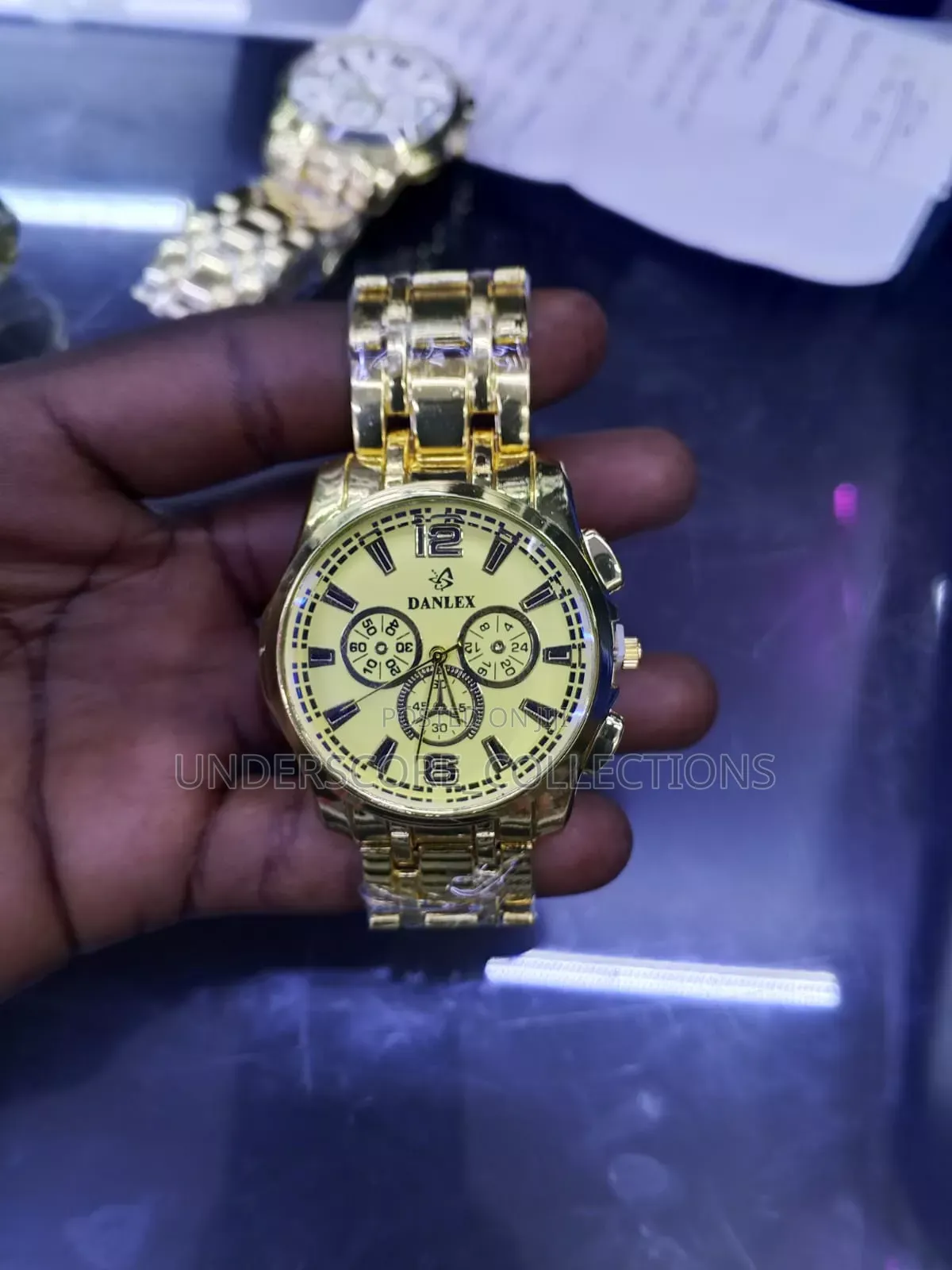 Classic Men's Gold Watch With a White Dial