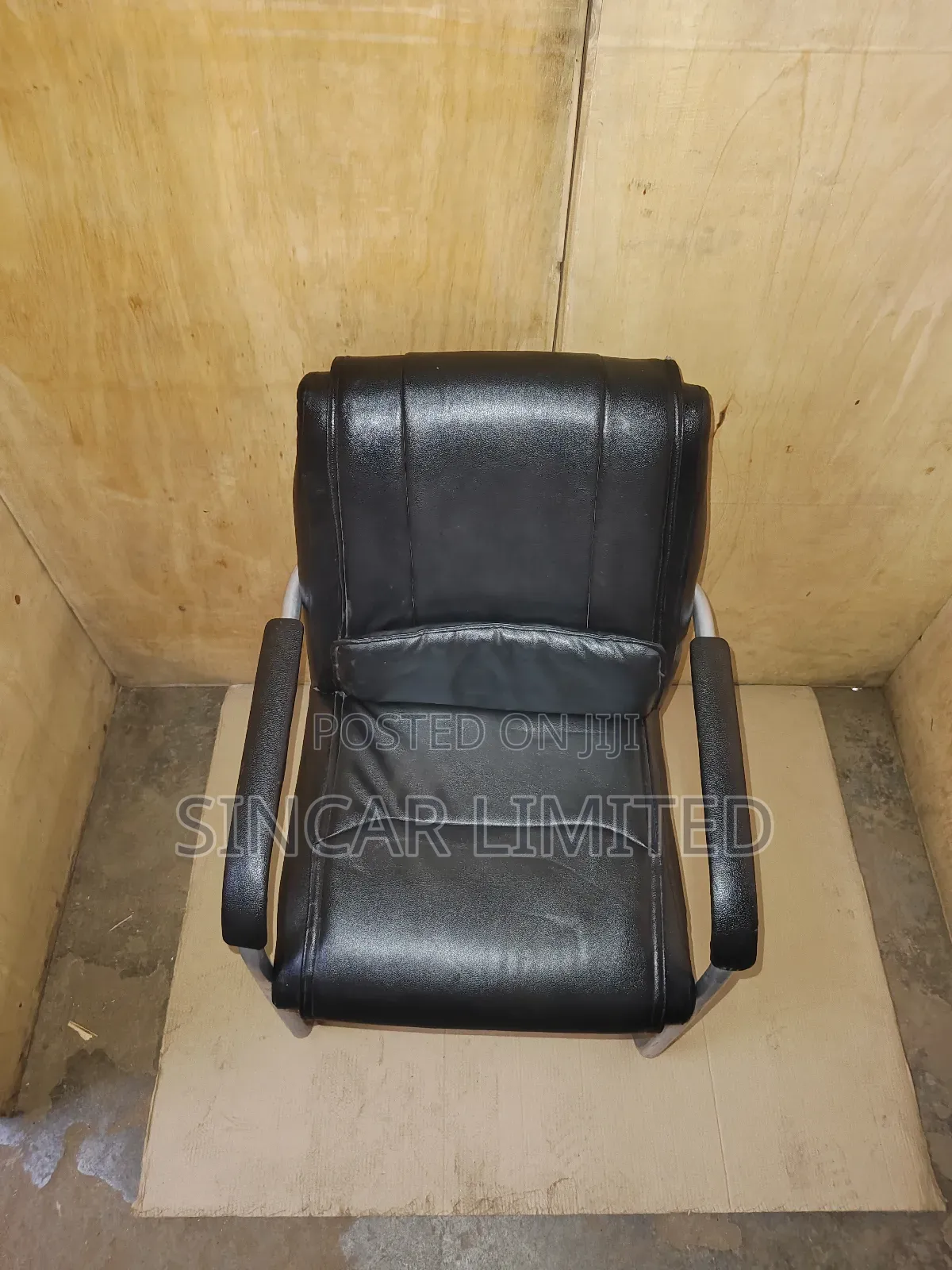 A Black Faux Leather Cantilever Office or Visitor Chair