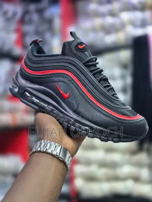 ￼

￼

This Is A Pair Of Nike Air Max 97s In A Black And Red