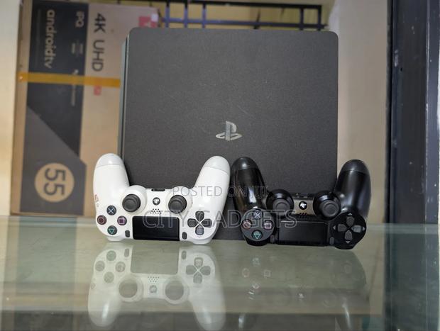 Ps4 Slim Pre-Owned With Two Controllers
