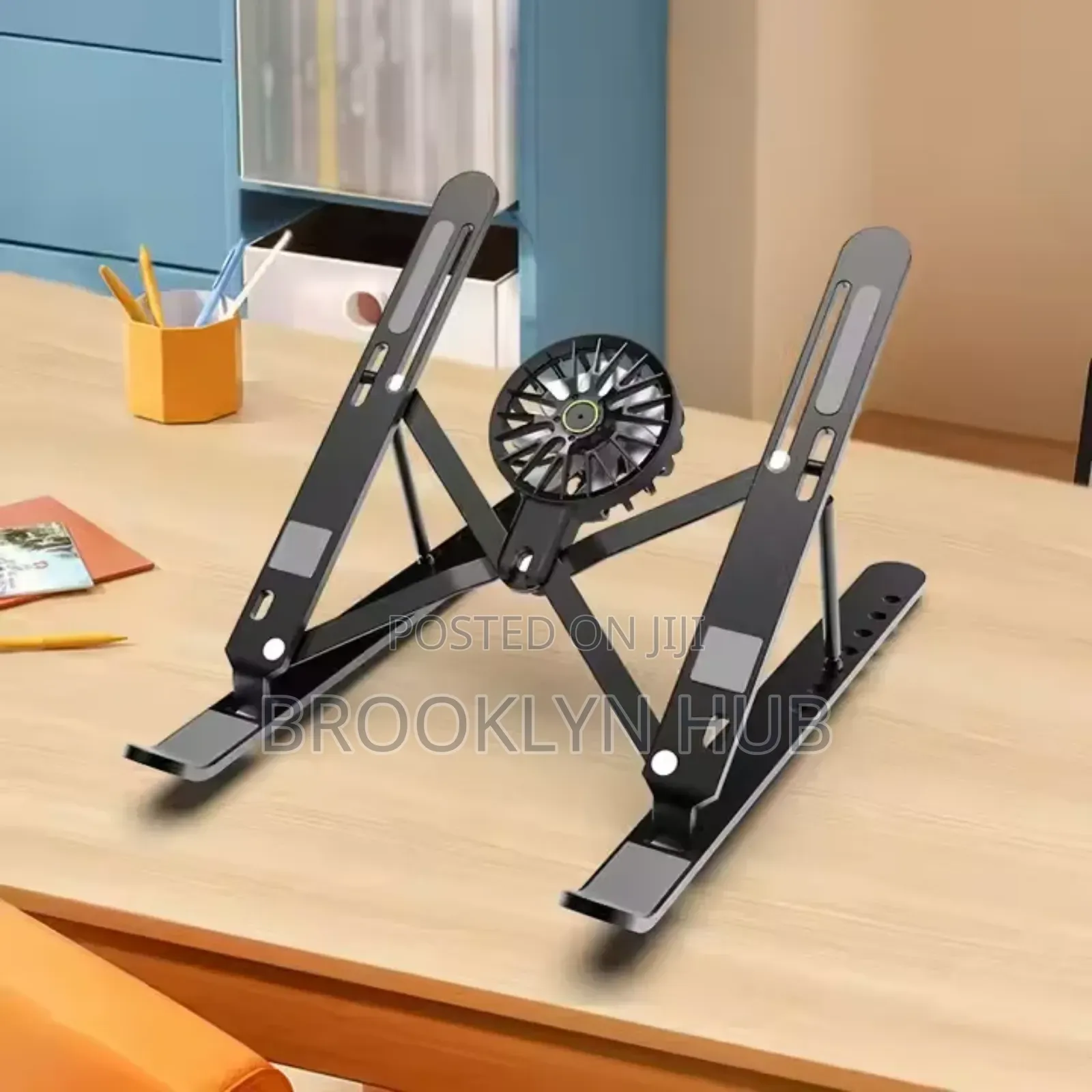Aluminum Alloy Laptop Stand With a Detachable Cooling Fan.