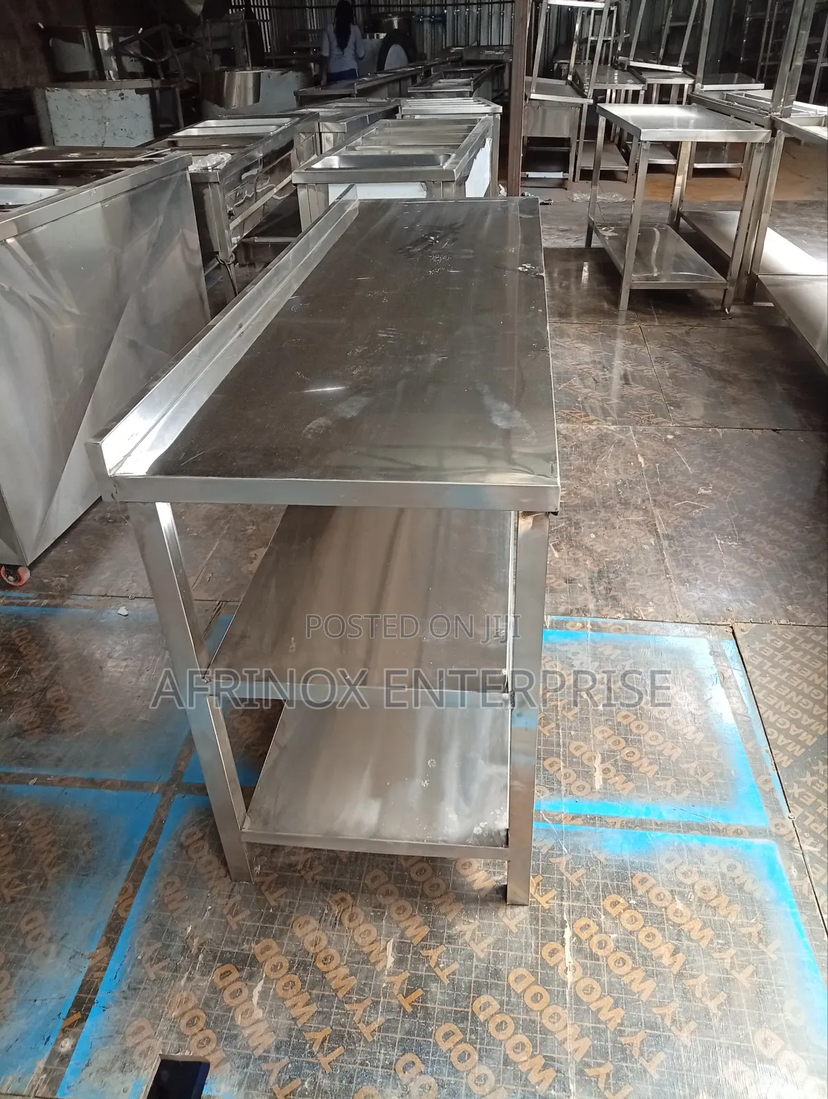 Stainless Table With Two Under Shelves. 6 Feets