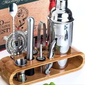 Cocktail Strainer and a Jigger, Part of a Bar Tool Set.
