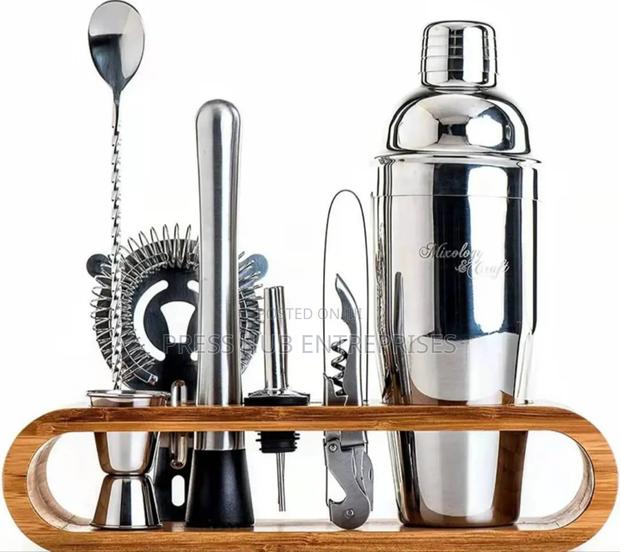 Cocktail Strainer and a Jigger, Part of a Bar Tool Set: 