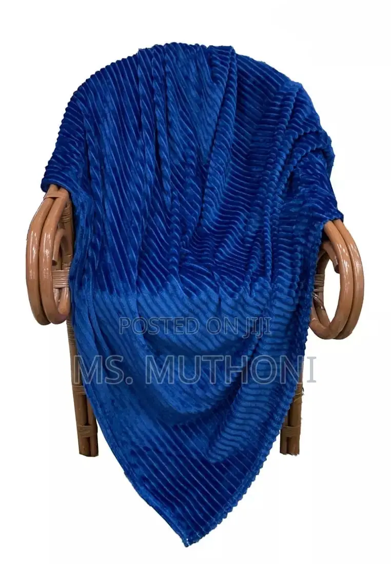 Bedsure Fleece Throw Blanket With a 3d Textured Striped Pattern.
