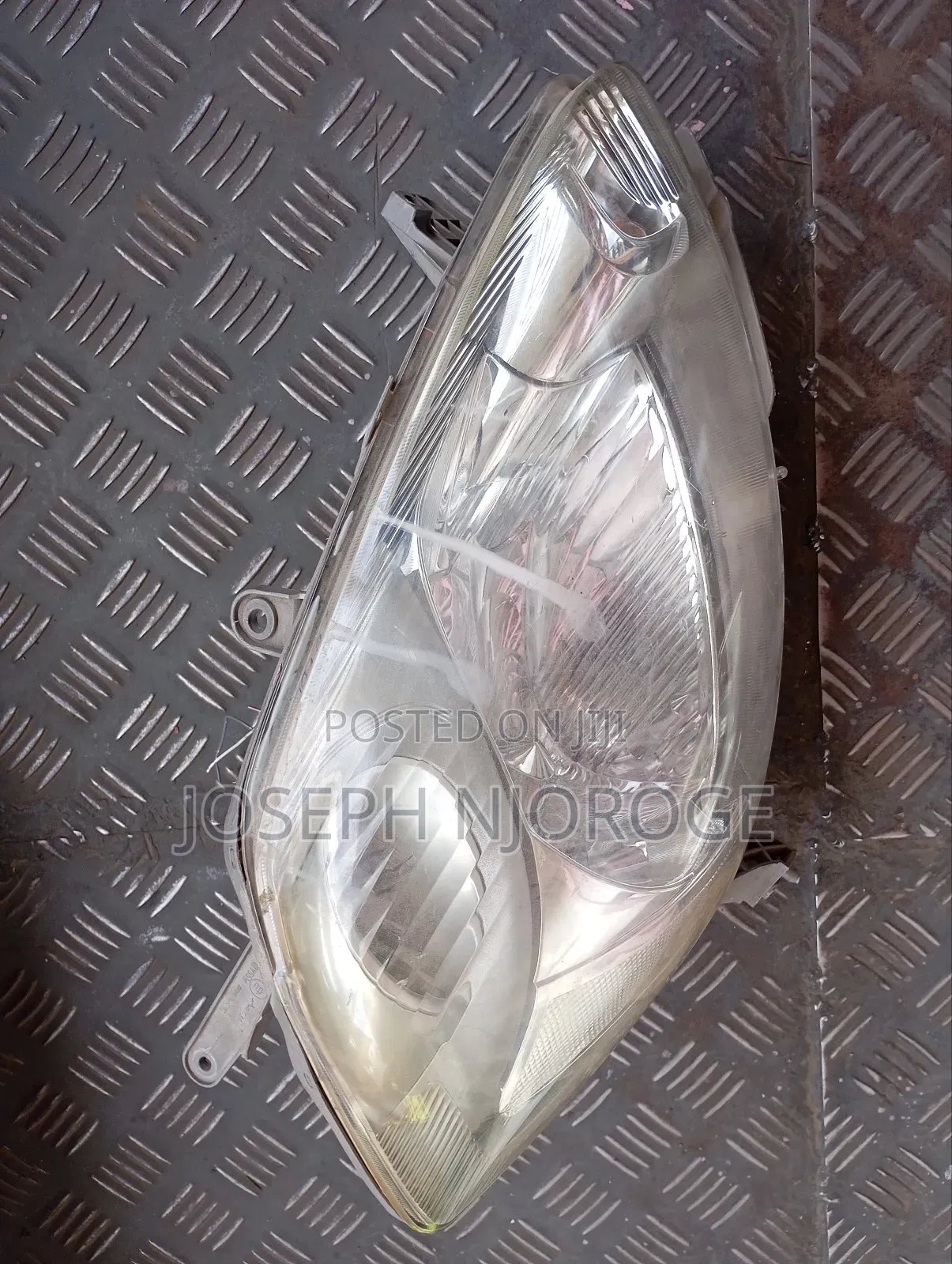 Passo 2005 Headlight Zenon