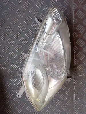 Passo 2005 Headlight Zenon