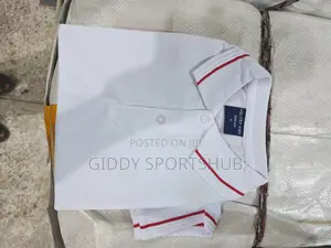 Polo Shirt With Red Stripes on the Collar and Cuffs.