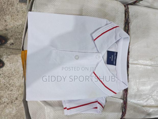 Polo Shirt With Red Stripes on the Collar and Cuffs. - thumbnail 3