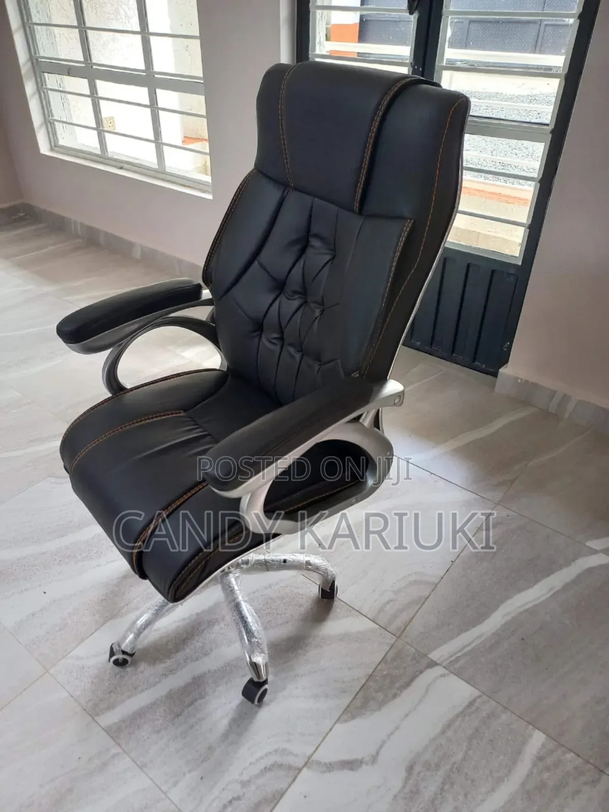 High Back Leather Office Seat With Padded Armrest