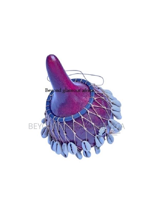 Maroon Medium Calabash Adorned With Cowrie Shells - main view