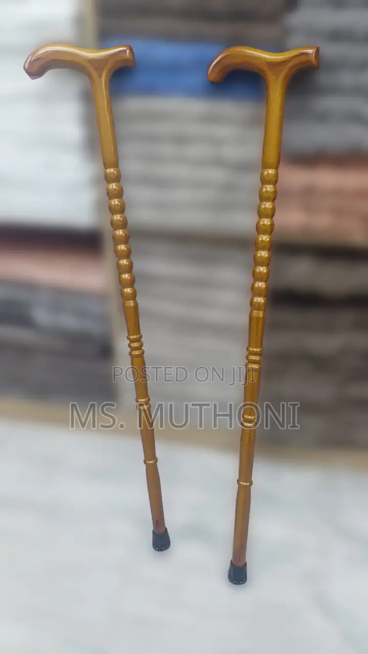 Handcrafted Wooden Walking Stick With a Carved Shaft
