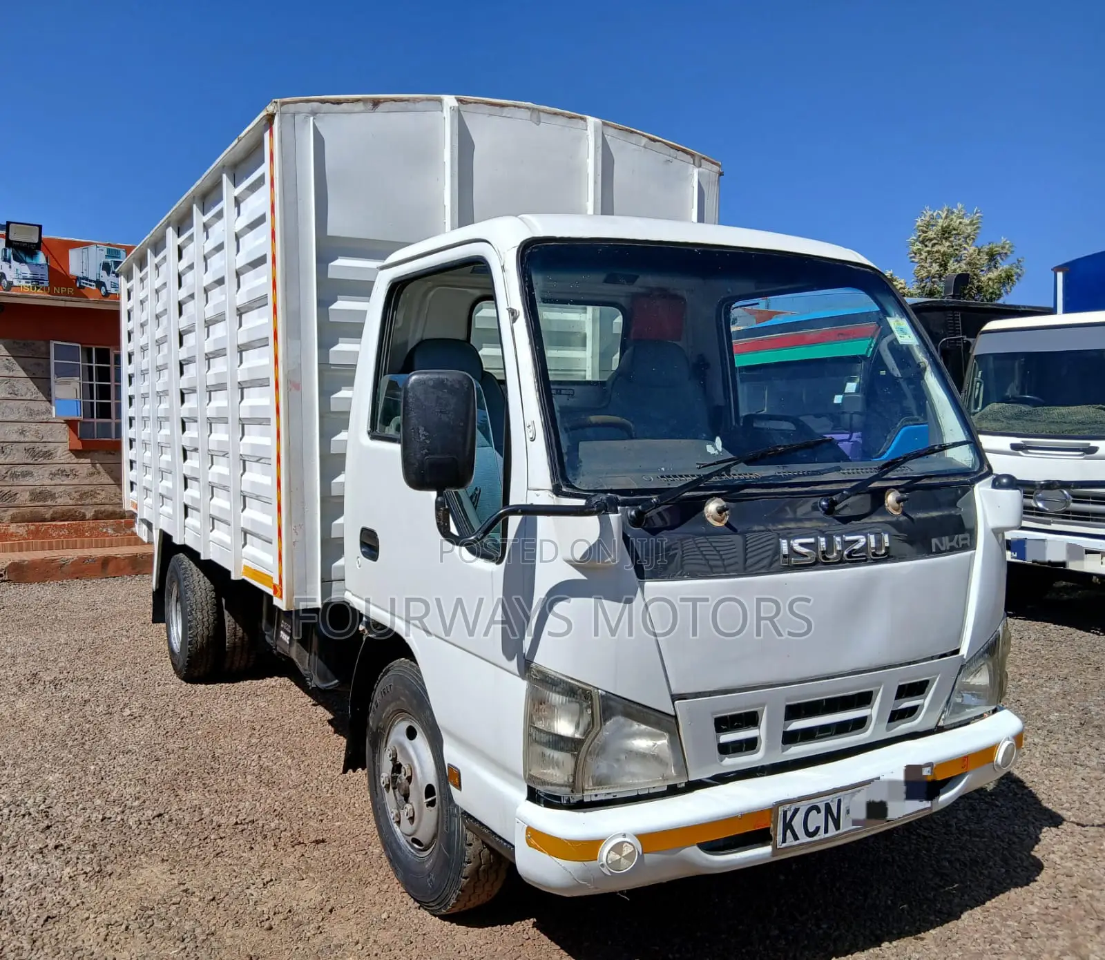 White Isuzu NKR