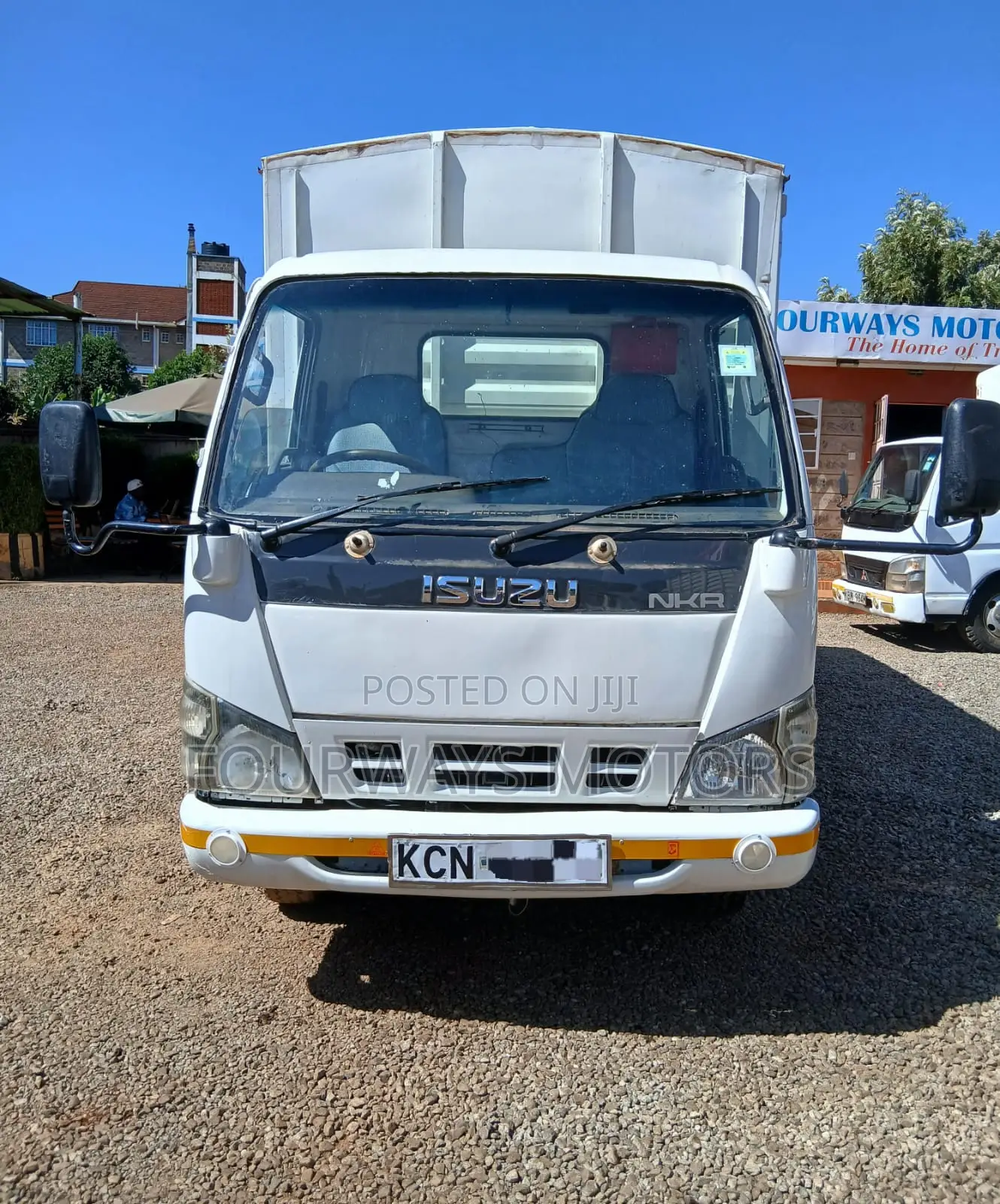 White Isuzu NKR
