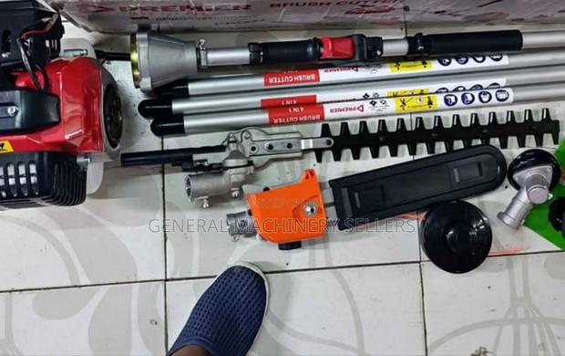 Brush Cutter With Hedge Trimmer and Chain Saw