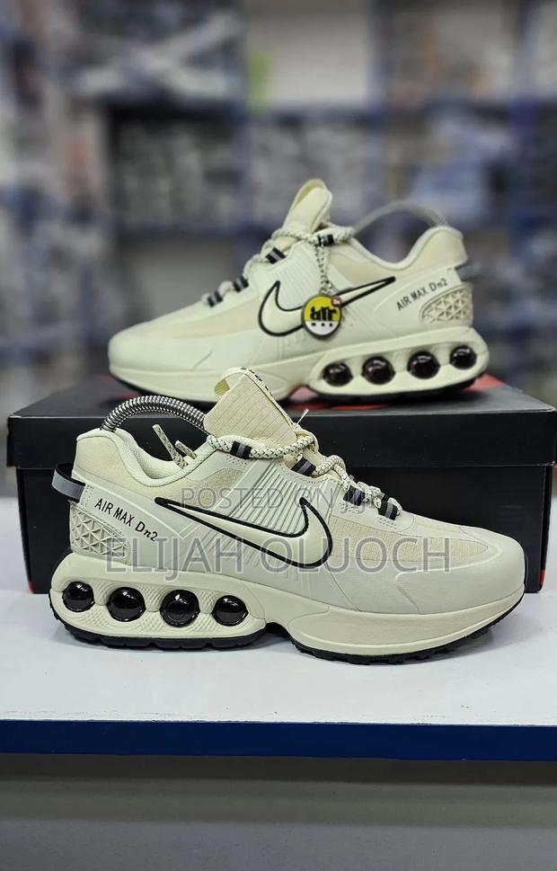 Nike Air Max Dn2 Sneaker In A Cream And Black