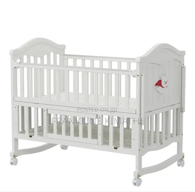 Portable, Multifunctional Wooden Baby Crib.