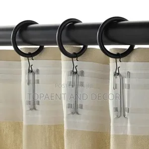 Round Rings Used to Hang Curtains on the Rod