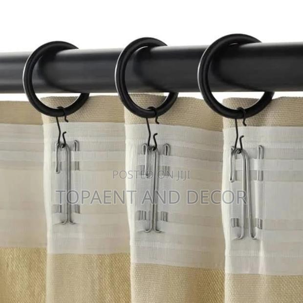 Round Rings Used to Hang Curtains on the Rod