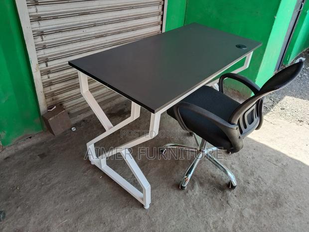 Office Table And Mesh Chair