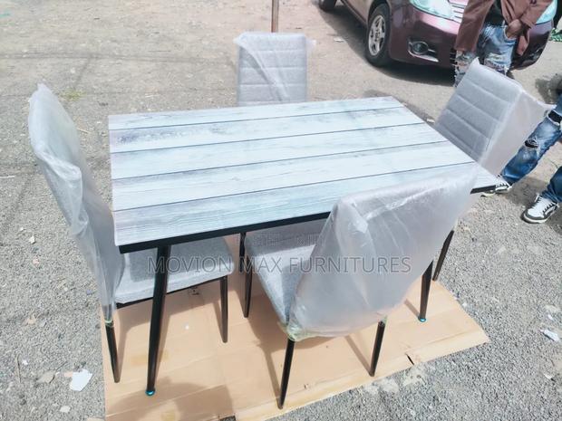 Top Glass Dinning Set 4sitter Dining Table