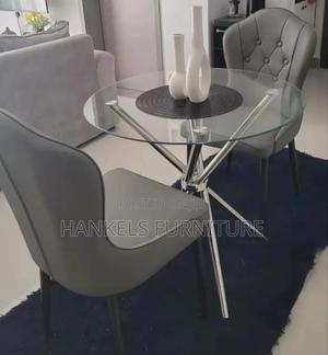 Stylish Round Glass Dining Set With Gray Chairs - main view