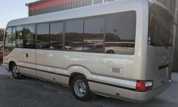 Toyota Coaster 2019 Beige - thumbnail 14