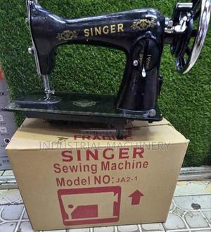 Singer Sewing Machine - thumbnail 2