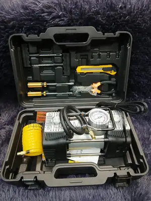 This Is a Portable Dual-Cylinder Car Air Compressor