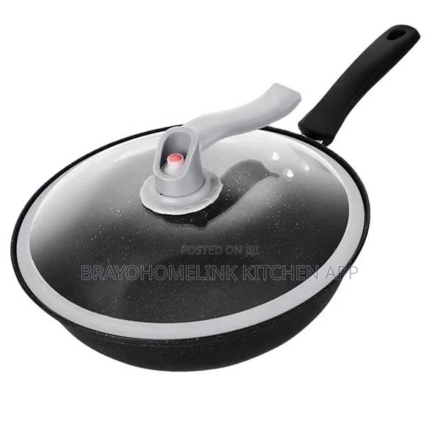 Wok Pan 
32 Cm Diameter 
Non Stick 
Glass Lid 
Pressure Release